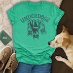 Green t-shirt with "UNDERDOGS" text and three dogs.