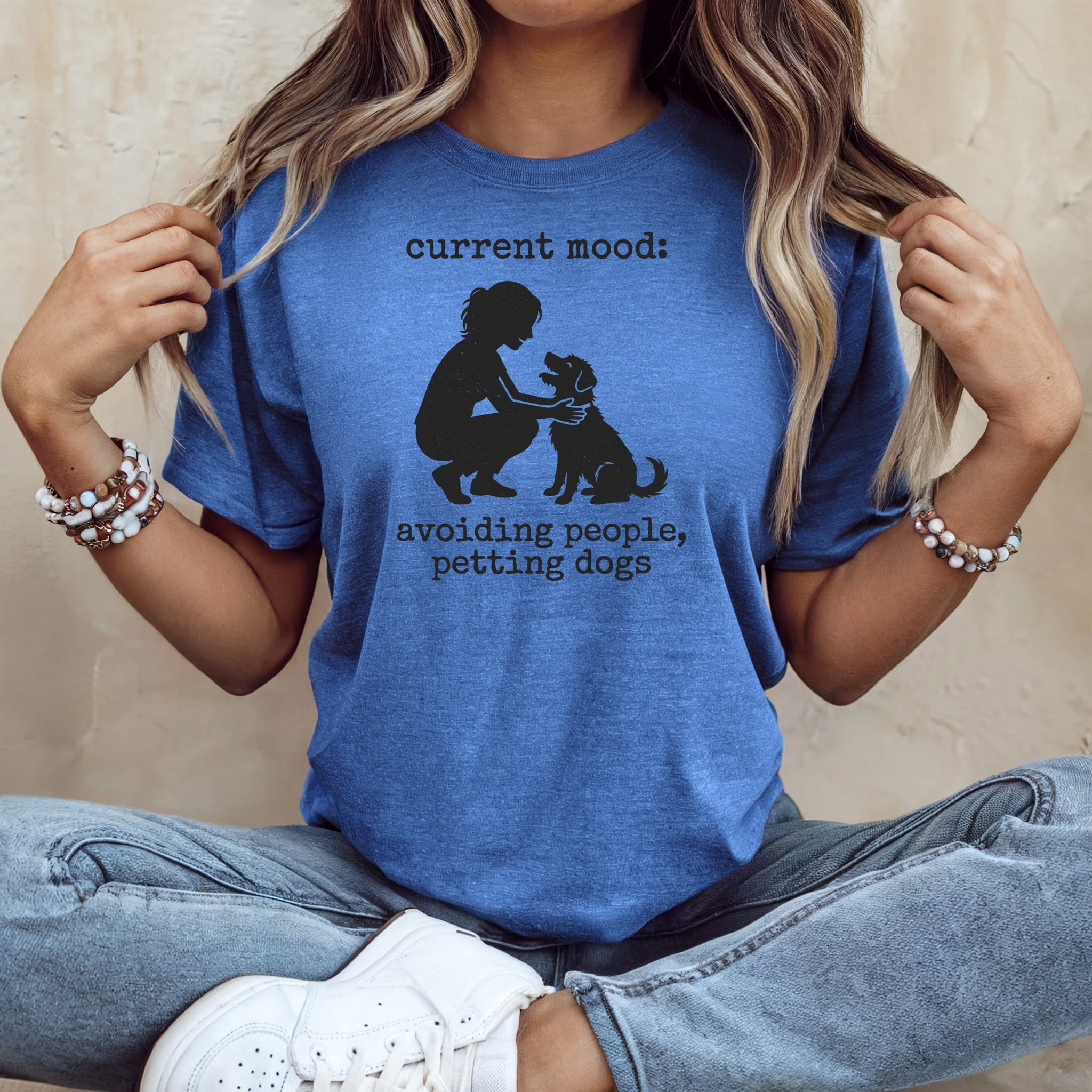Blue t-shirt with "current mood: avoiding people, petting dogs" graphic.