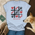 Light blue t-shirt with tic-tac-toe game featuring paw prints, bones, and hearts.