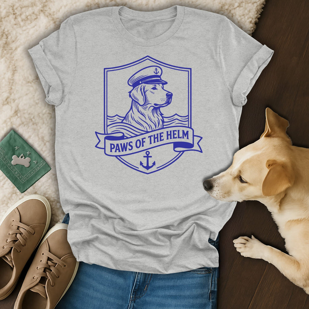 Grey t-shirt with a golden retriever wearing a captain's hat and the text "Paws of the Helm".