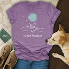 Purple t-shirt with a surfing dog and "Night Pawtrol" text.