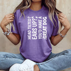 Purple t-shirt with white text: "Head tilted? Ears up? You'd make a great dog."
