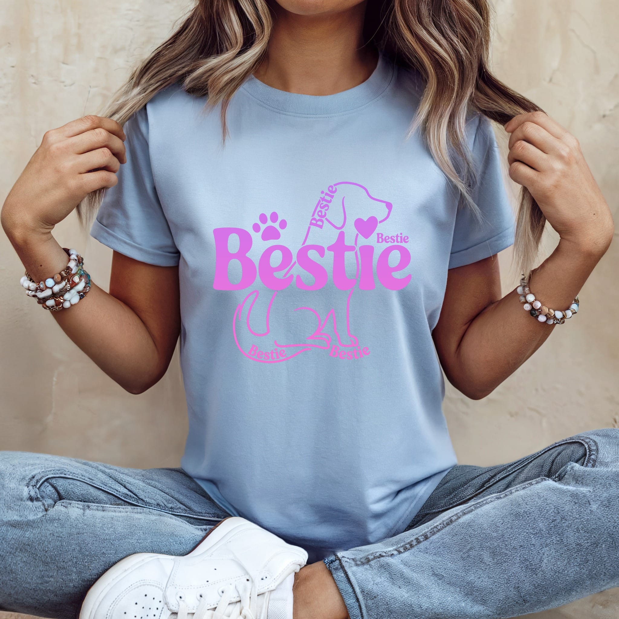 Light blue t-shirt with "Bestie" text and paw print design.
