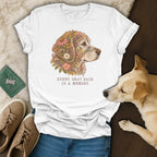 A white t-shirt featuring a golden retriever illustration with flowers and the text Every Gray Hair Is A Memory.