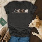 Dark grey t-shirt with five dogs dressed in Halloween costumes walking in a line.