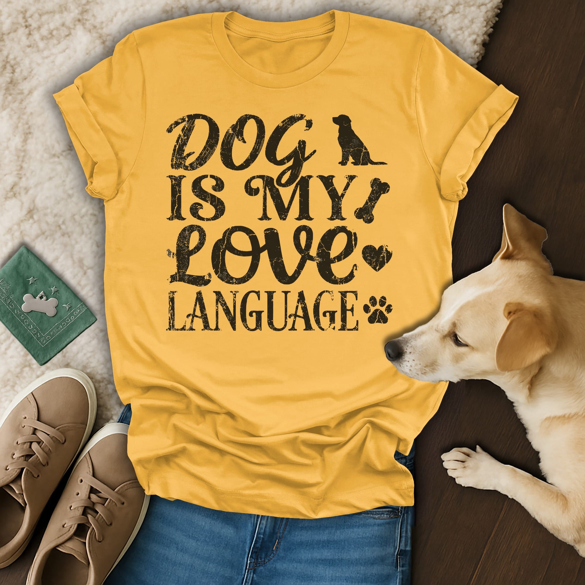 Yellow t-shirt with "Dog is my love language" text and dog paw graphic.