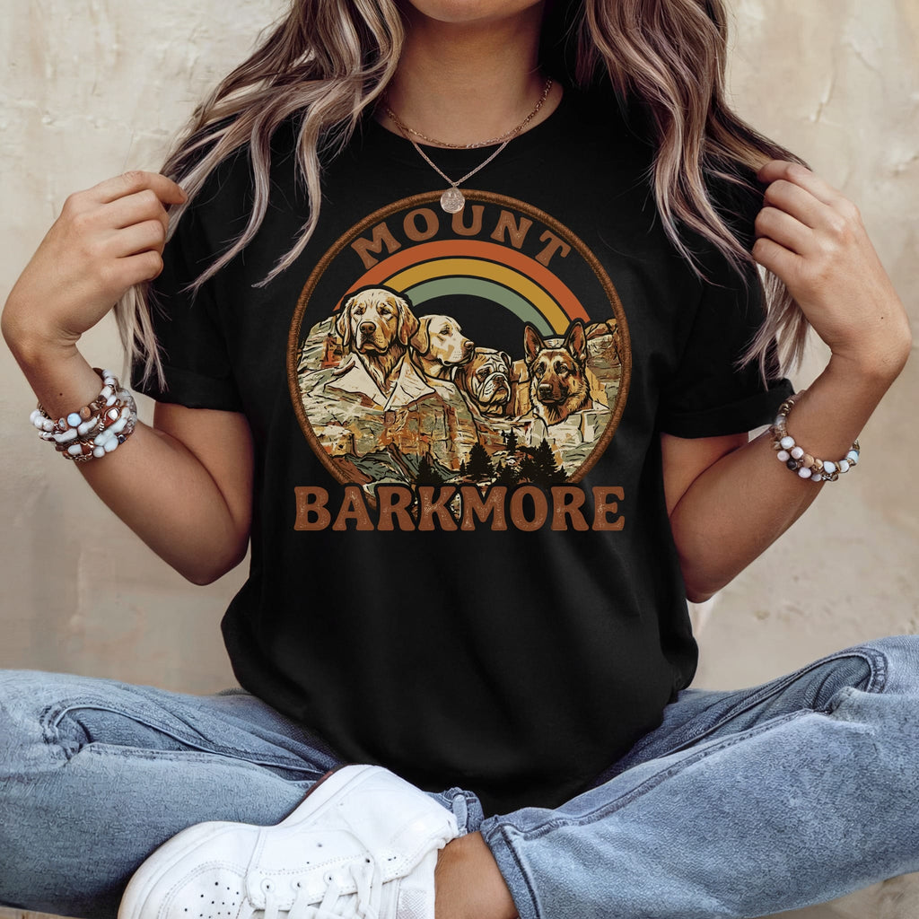 Black t-shirt with dogs, mountains, and rainbow graphic, text "MOUNT BARKMORE".