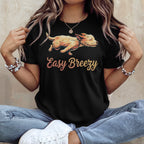 Black t-shirt with "Easy Breezy" and a stylized dog graphic.