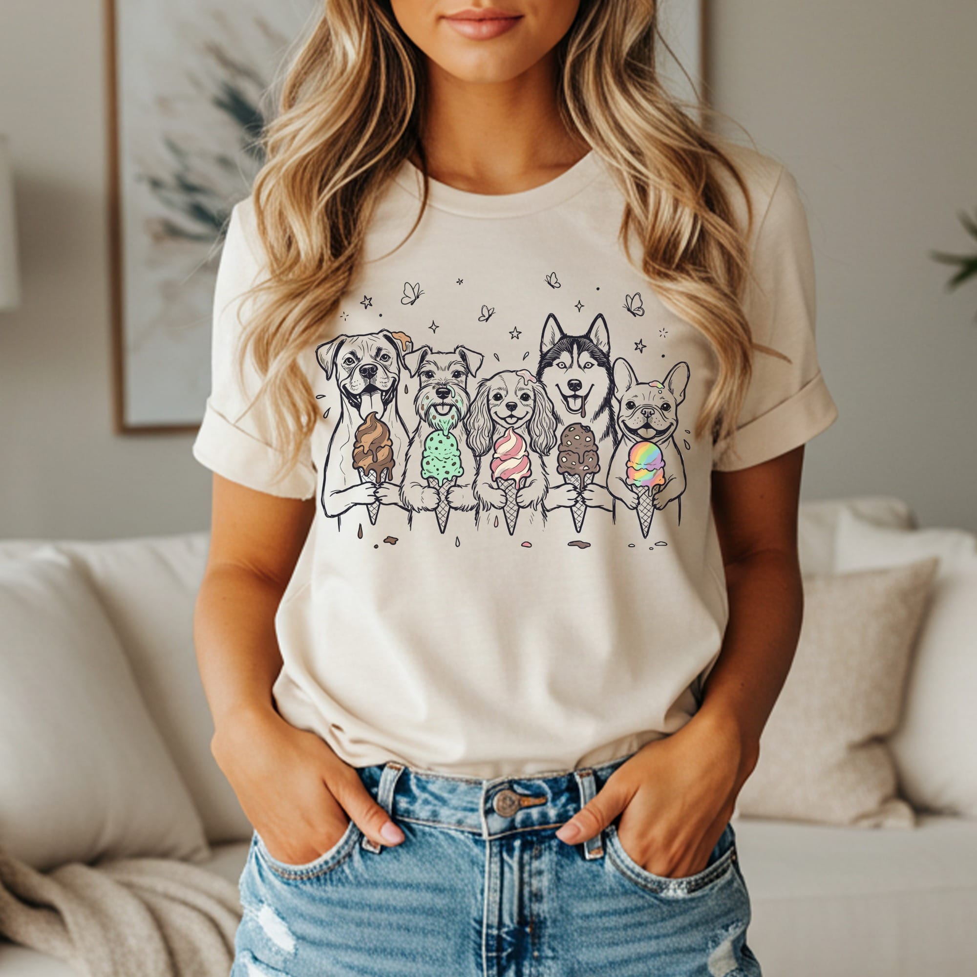 Line drawing of dogs holding ice cream cones on a cream t-shirt.