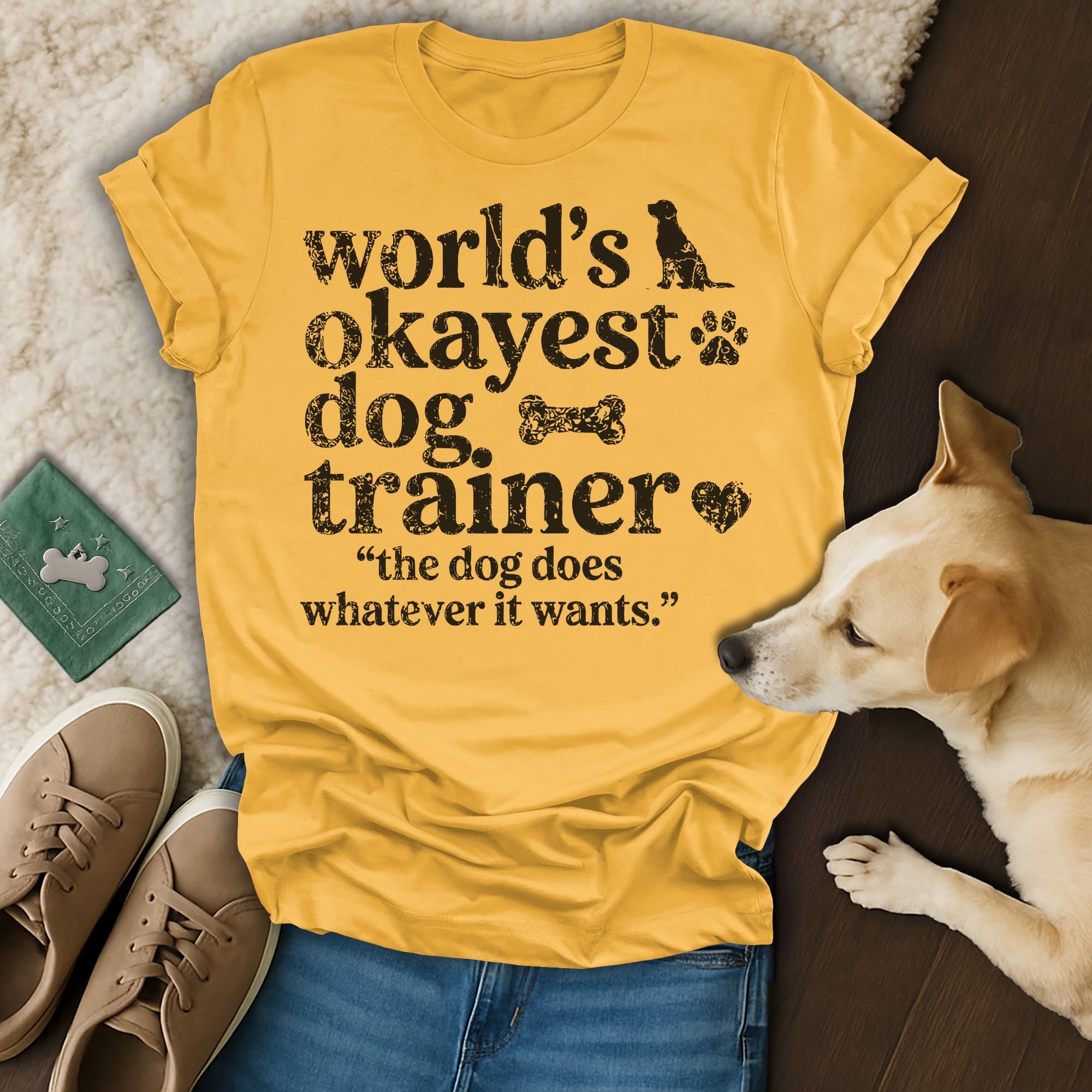Yellow t-shirt with "world's okayest dog trainer" and dog graphic.