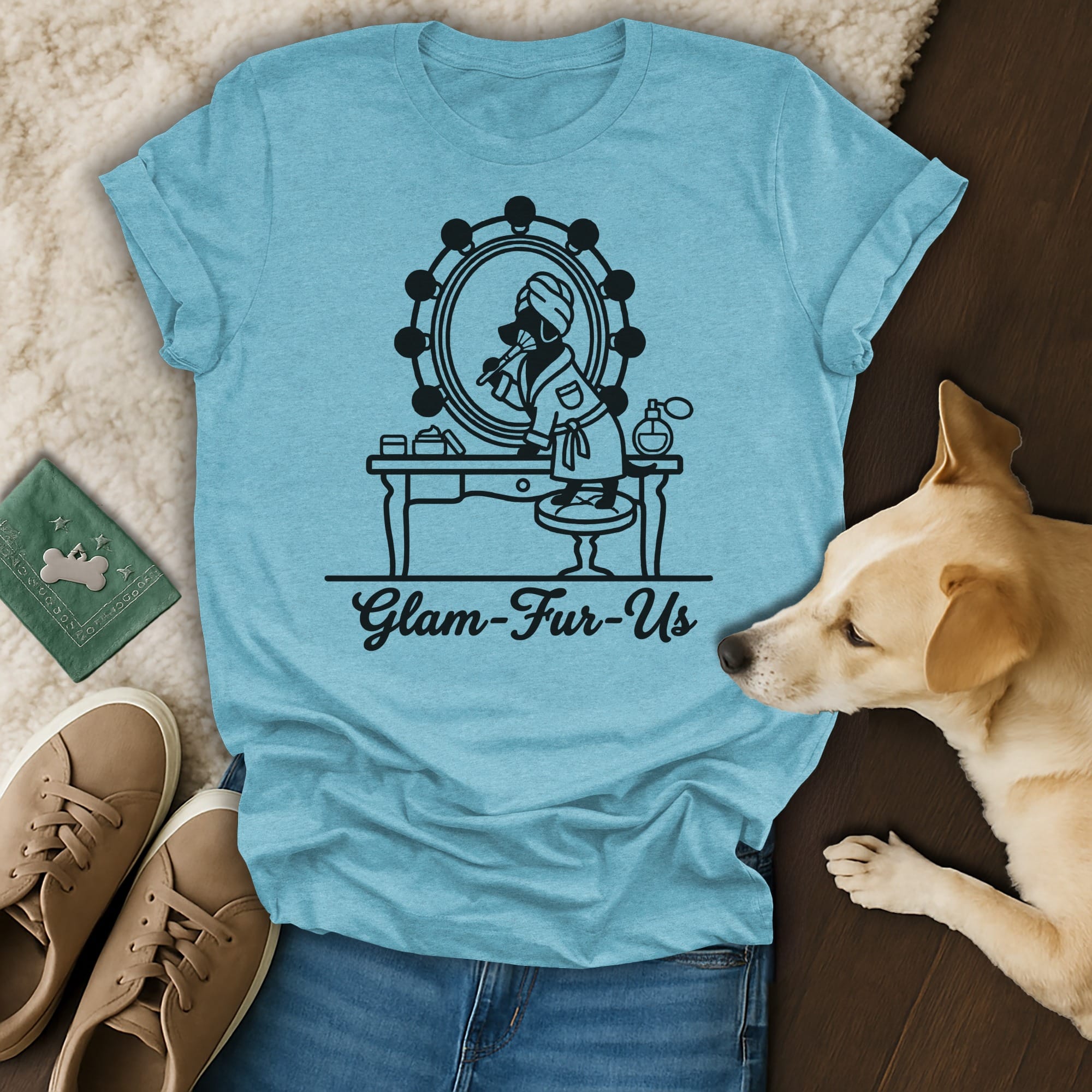 T-shirt with dog at vanity mirror applying makeup, text "Glam-Fur-Us".