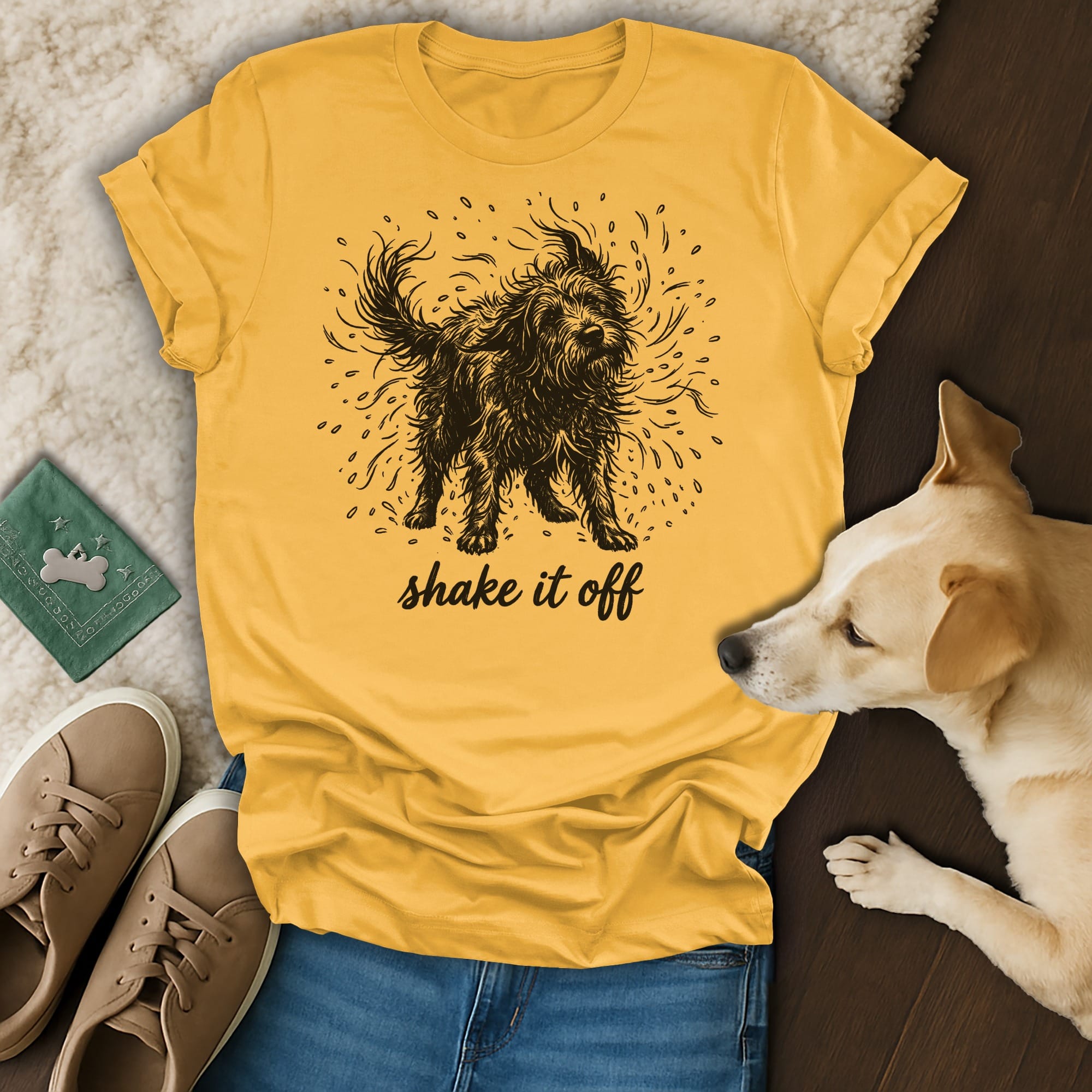 Yellow t-shirt with a dog graphic and "shake it off" text.
