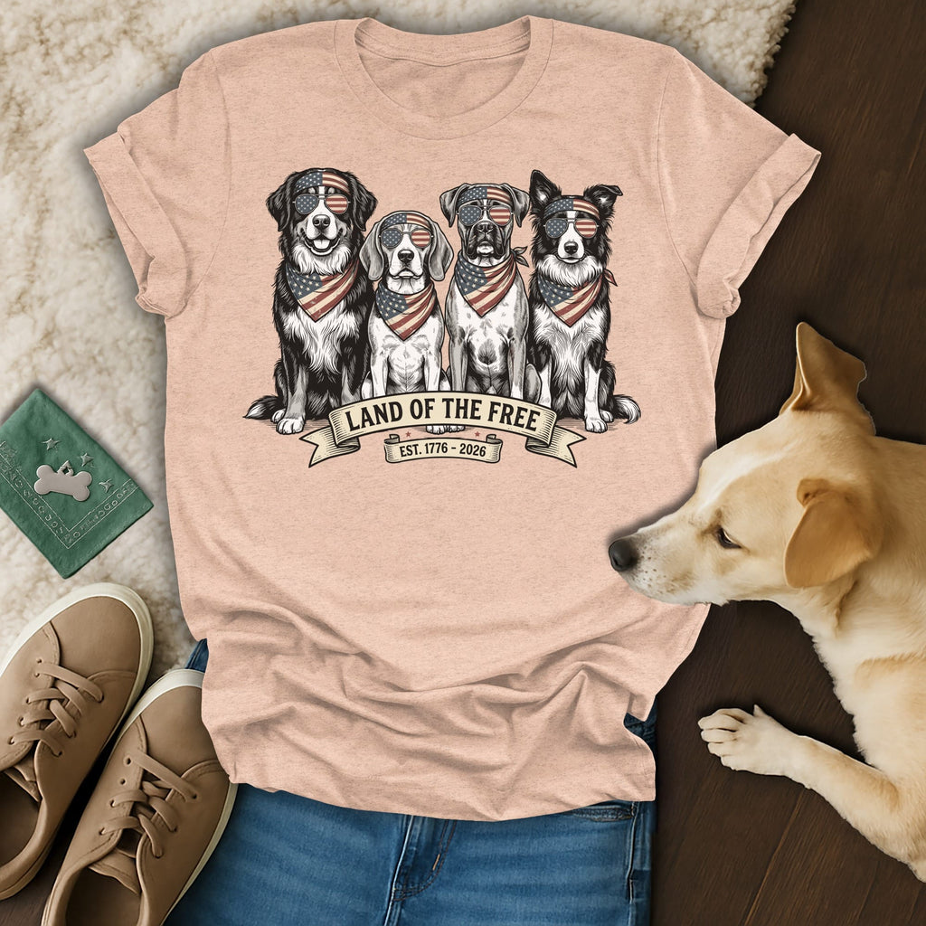 Four dogs wearing bandanas and sunglasses with "Land of the Free" text.