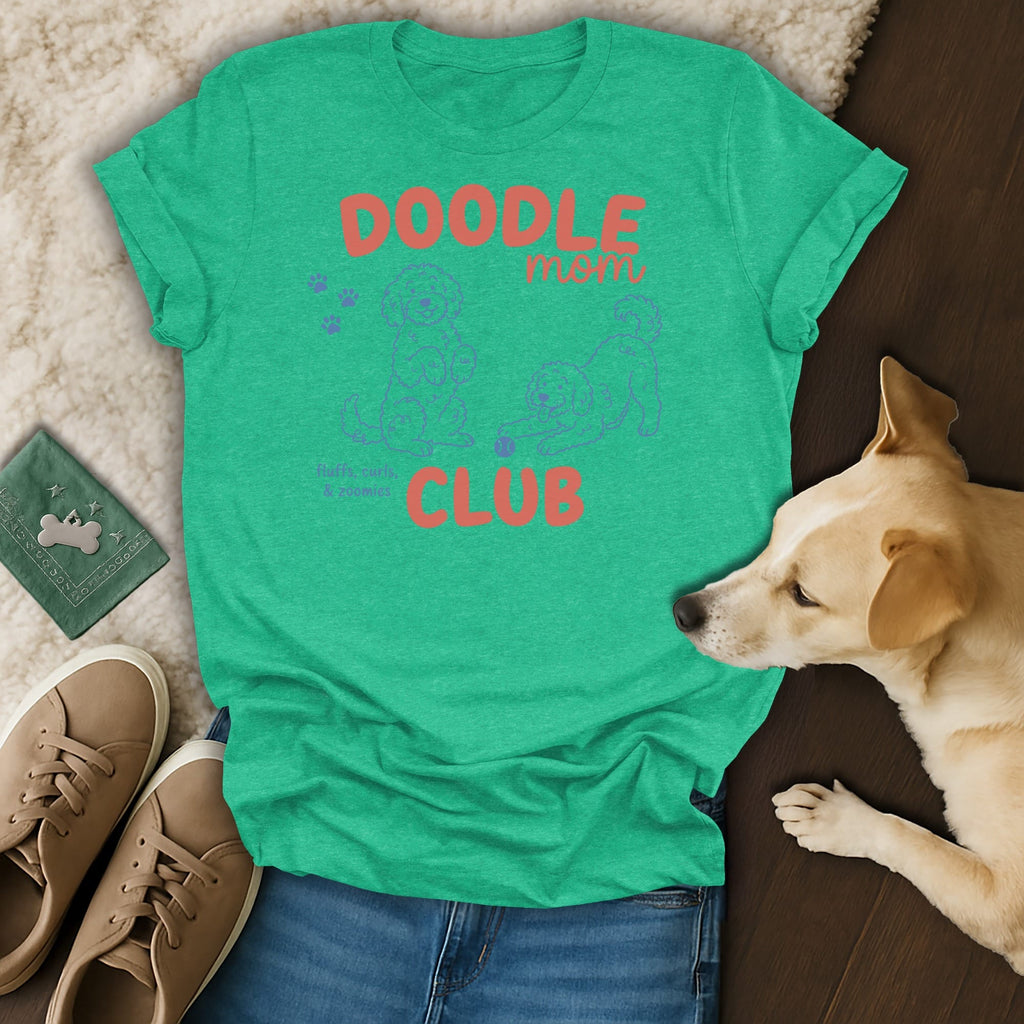 Green t-shirt with "Doodle Mom Club" text and doodle dog illustrations.