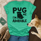 Green t-shirt with "PUG ME I'M ADORABLE" text and a pug graphic.