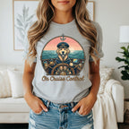 Golden retriever captain wearing hat at ship's wheel, text "On Cruise Control".