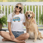 White t-shirt with graphic of dogs in a van and red hearts.