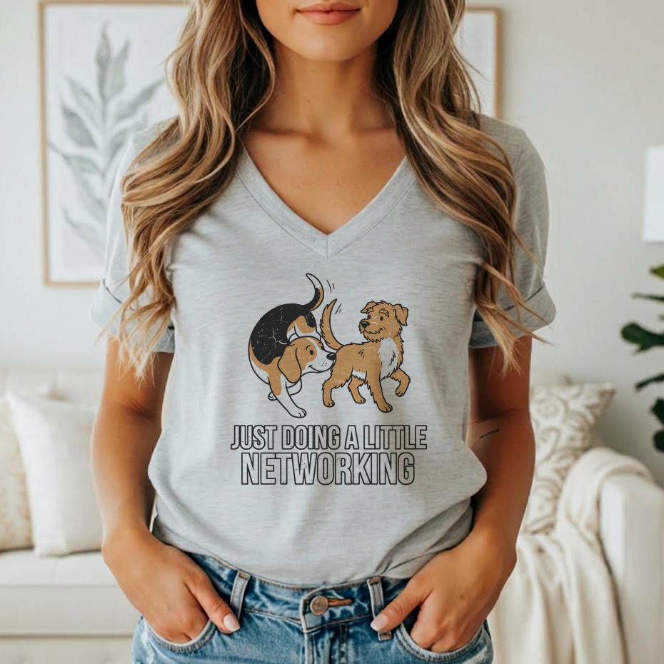 Light gray t-shirt with cartoon dogs and text "JUST DOING A LITTLE NETWORKING".