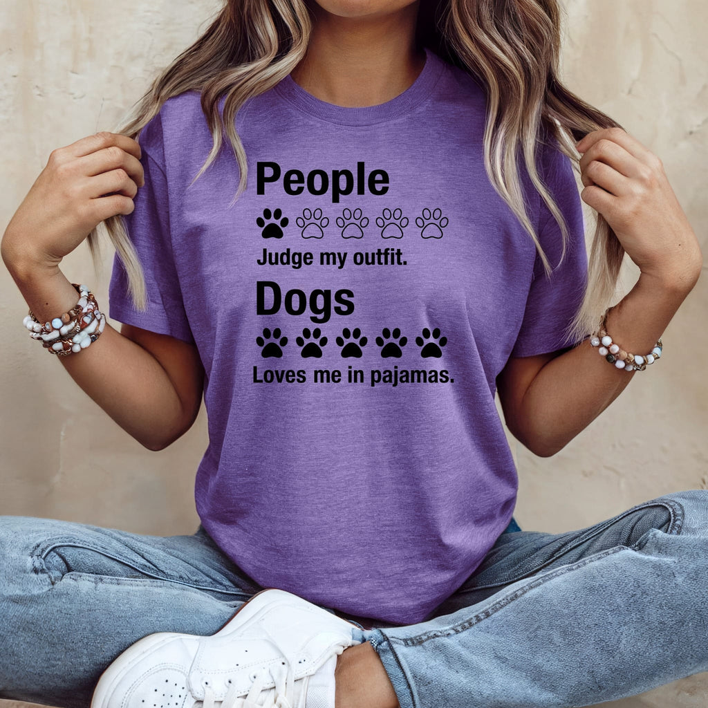 Purple t-shirt with text: "People Judge my outfit. Dogs Loves me in pajamas."