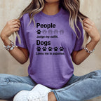 Purple t-shirt with text: "People Judge my outfit. Dogs Loves me in pajamas."