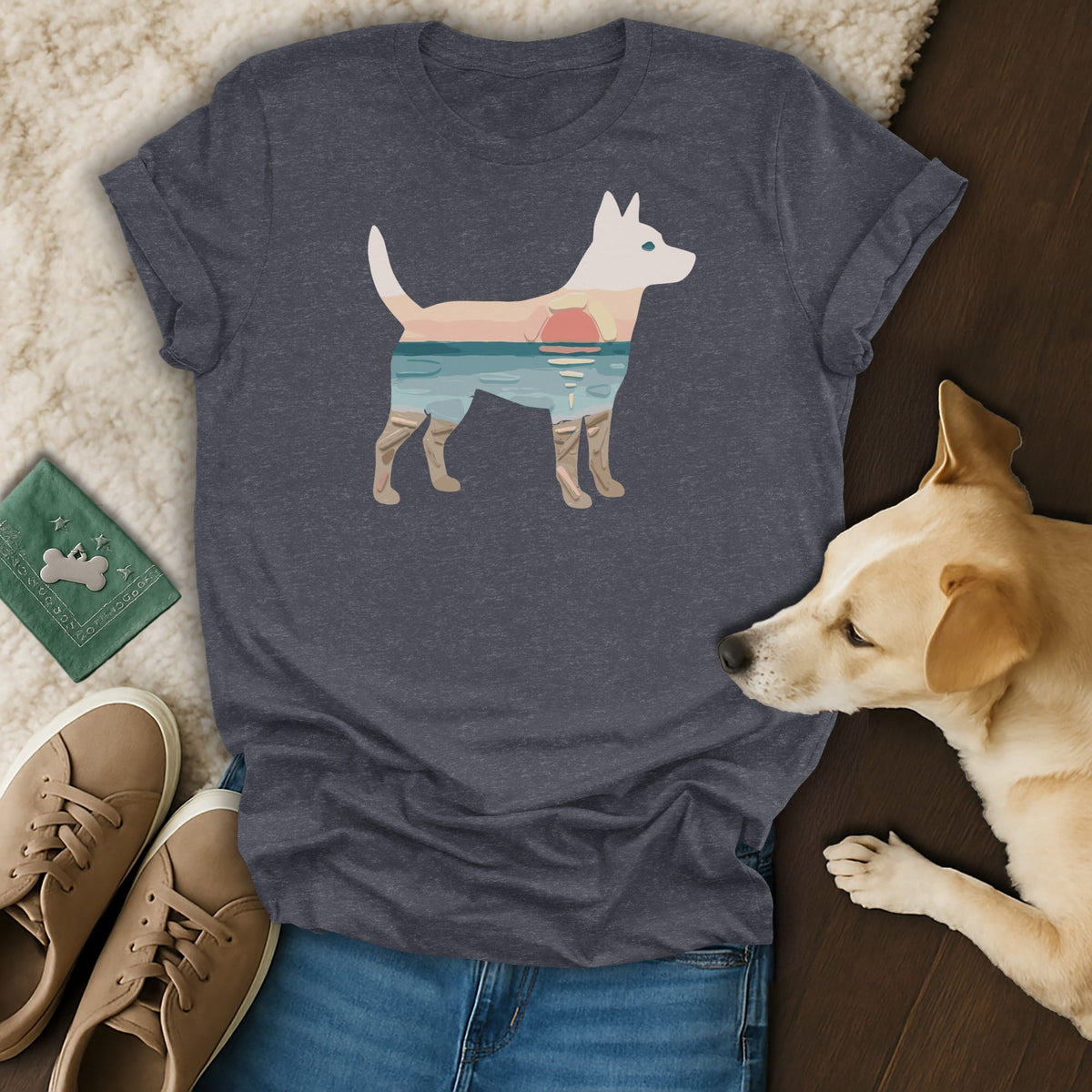 Dark grey t-shirt with a white dog silhouette filled with a sunset beach scene.