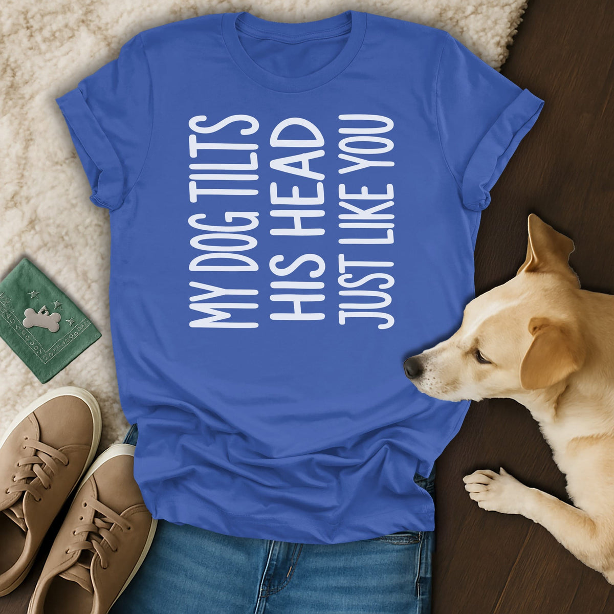 Blue t-shirt with white text "MY DOG TILTS HIS HEAD JUST LIKE YOU"