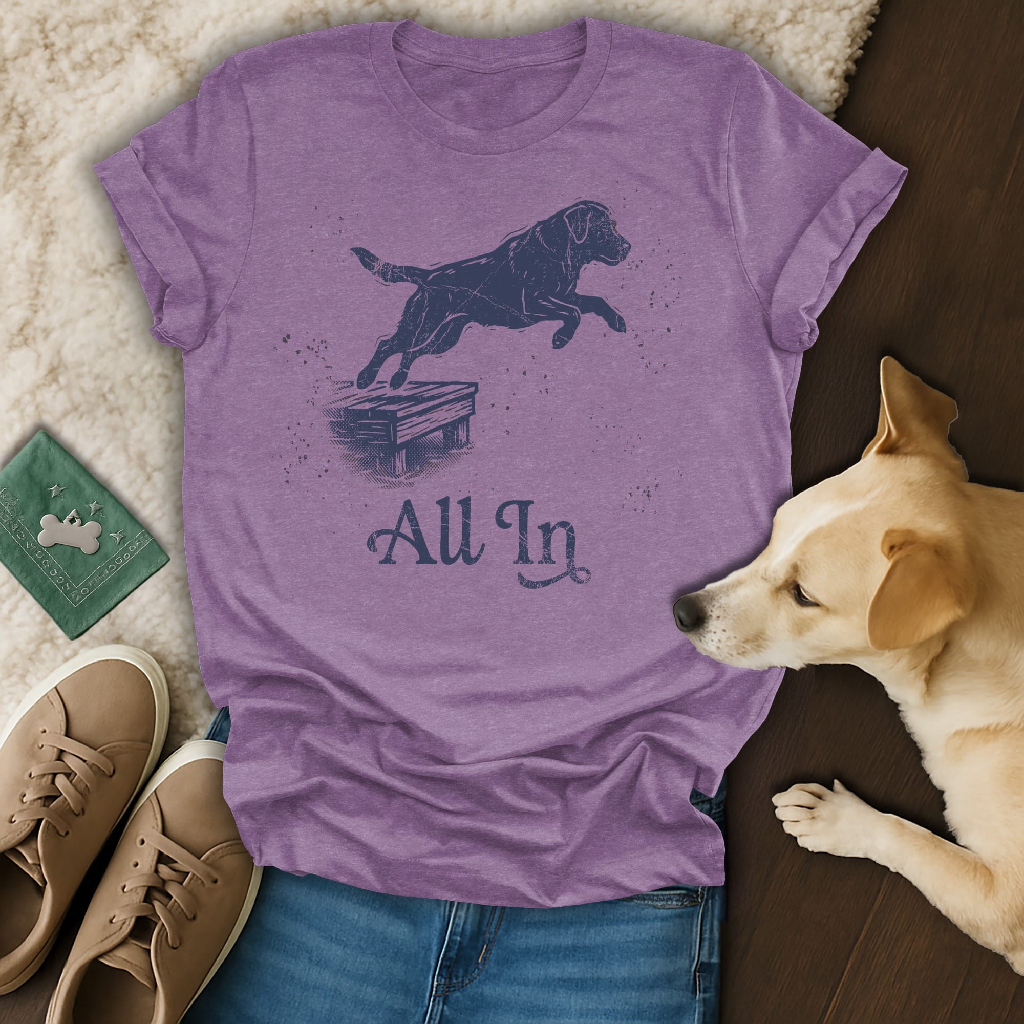 Purple t-shirt with a black lab jumping over a hurdle, text "All In".