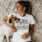 Woman with dog wearing white t-shirt with American flag bandana dogs.