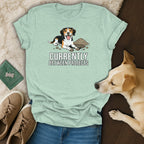 Light blue t-shirt with cartoon dog digging dirt and text "CURRENTLY BETWEEN PROJECTS".
