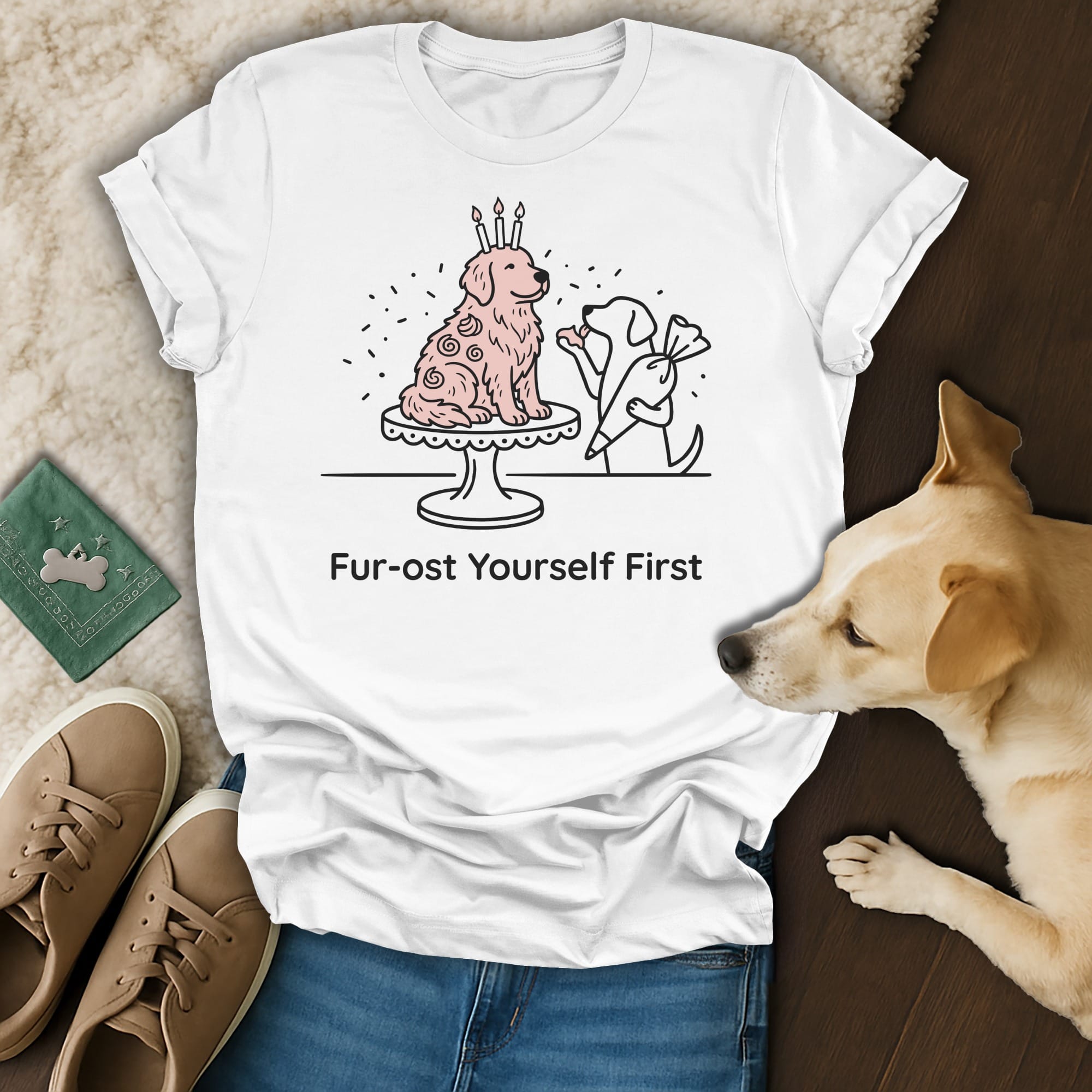 White t-shirt with dog wearing a crown on a cake, text reads "Fur-ost Yourself First".