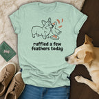 Light blue t-shirt with a corgi and duck illustration and text.