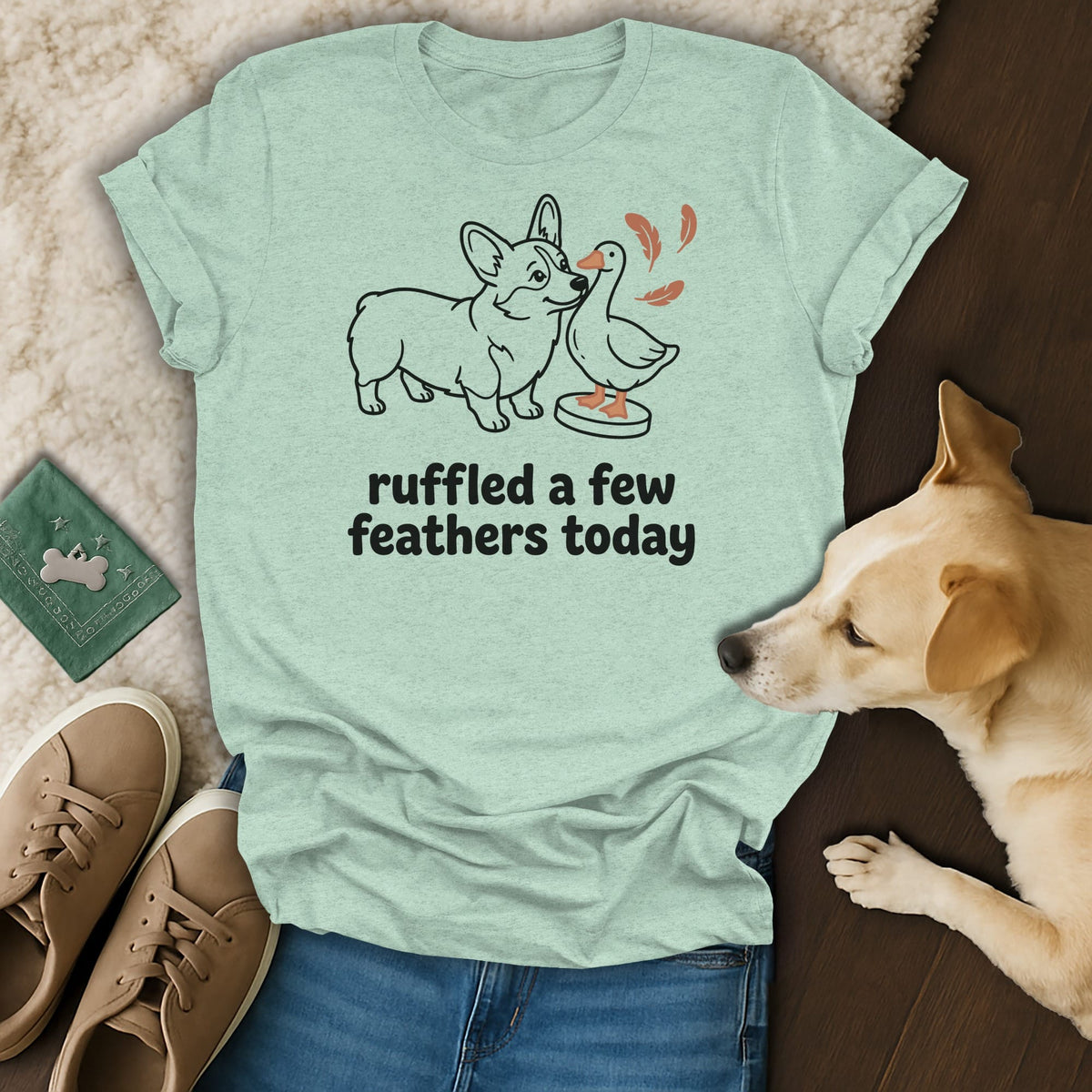 Light blue t-shirt with a corgi and duck illustration and text.