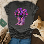 Dark gray t-shirt featuring pink and purple paw prints in cowboy boots.