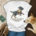 White t-shirt with a dog silhouette filled with American flag, stars, and fireworks.