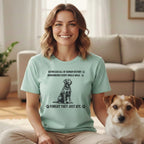T-shirt with dog graphics and text about dogs remembering walks and food.