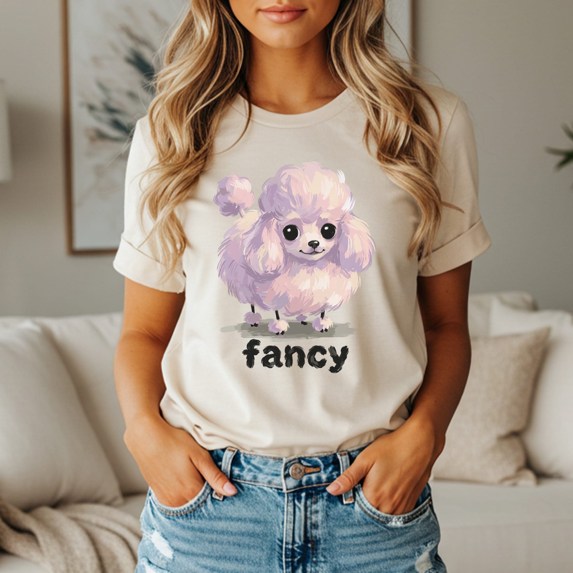 Light purple poodle graphic on a tan t-shirt, "fancy" text below.