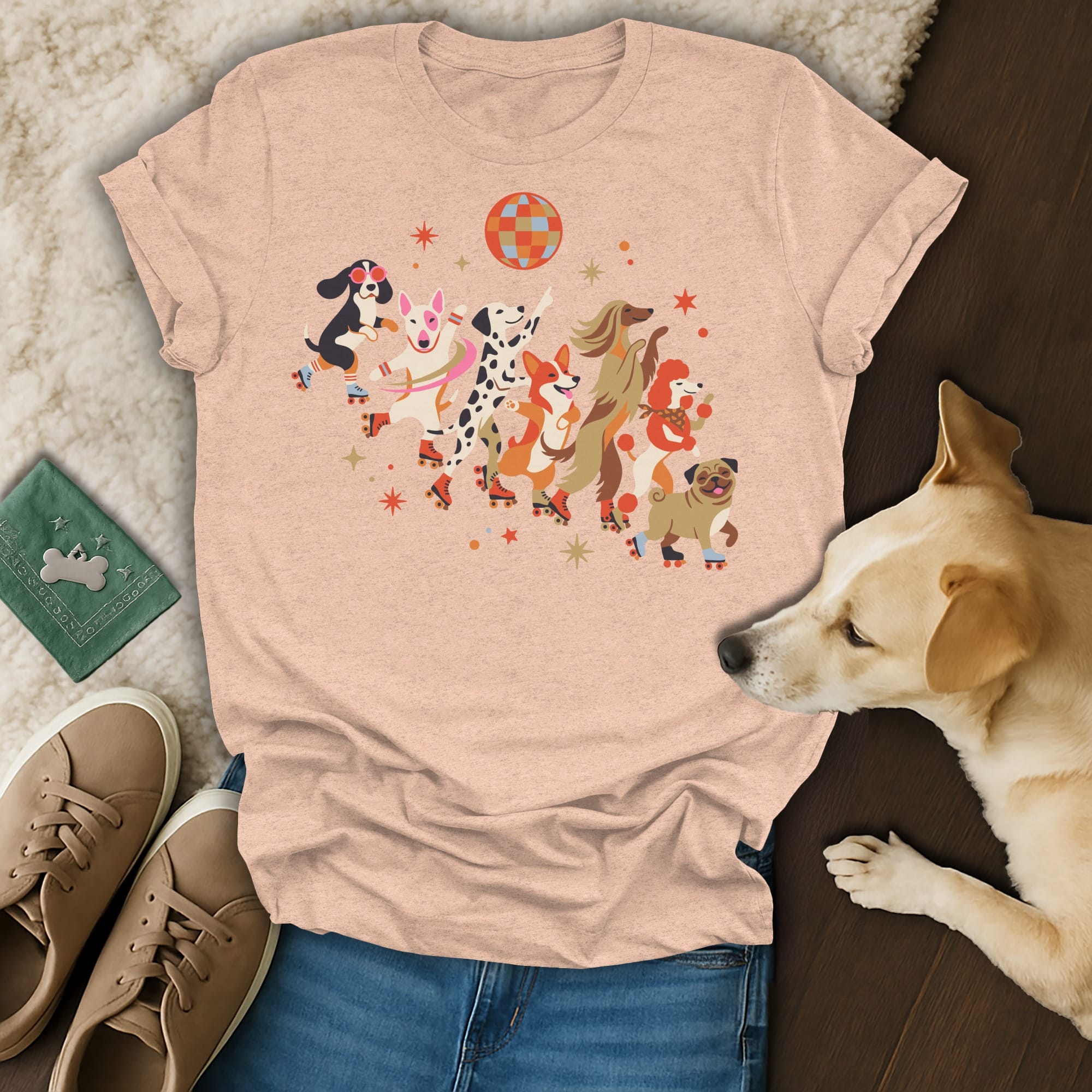 T-shirt with cartoon dogs on roller skates dancing under a disco ball.
