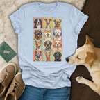 Grid of twelve dog portraits on a light blue t-shirt.