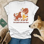 White t-shirt with graphic of woman and dog, surrounded by flowers.