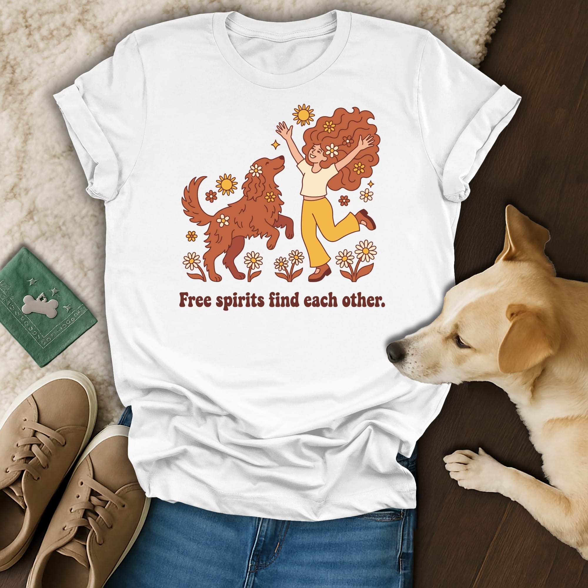 White t-shirt with graphic of woman and dog, surrounded by flowers.
