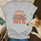 Light grey v-neck t-shirt with graphic "TRAIL MIX" and five dogs hiking.