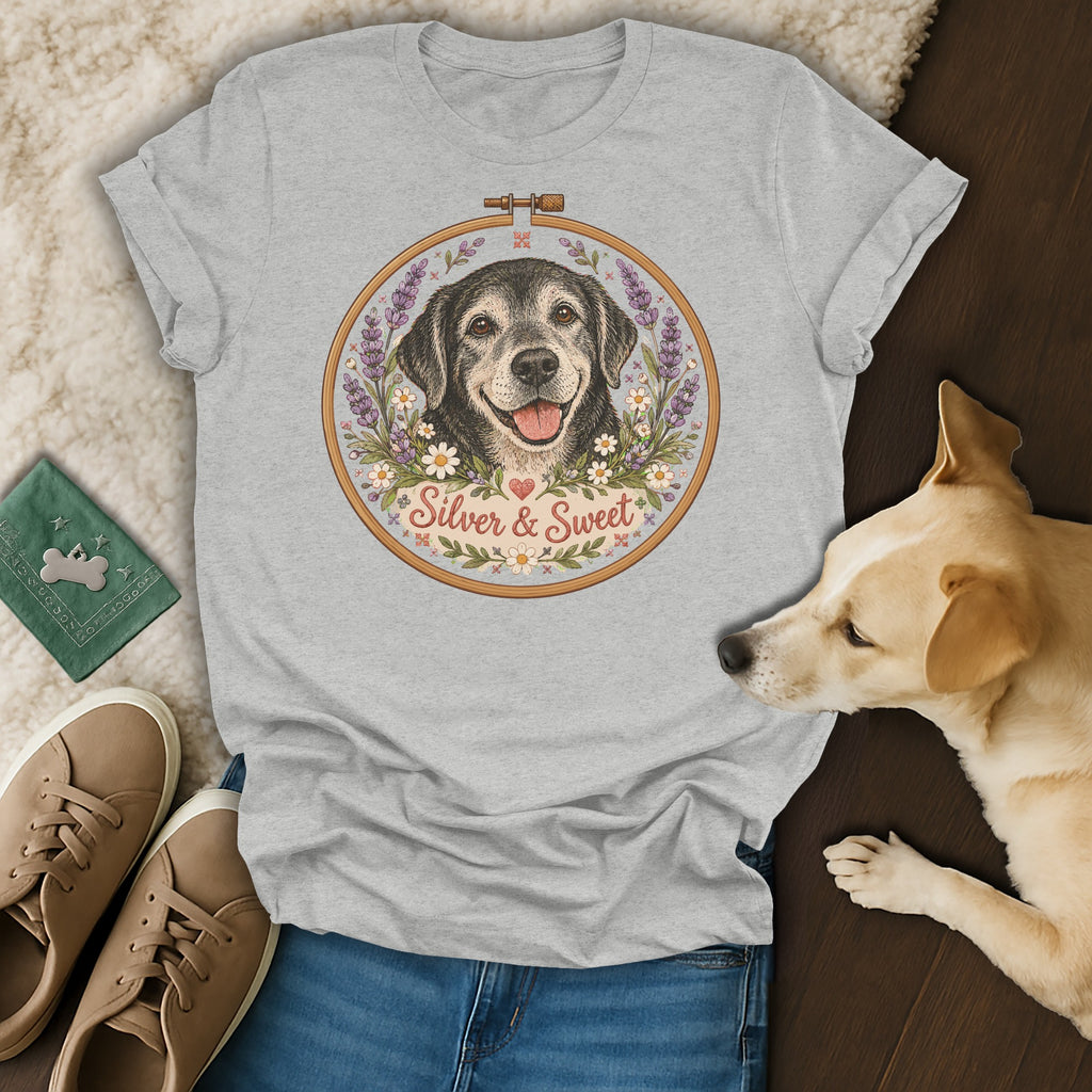 Gray t-shirt featuring an embroidered design of a dog inside a floral hoop with the text Silver & Sweet.