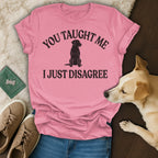 Pink t-shirt with a black dog silhouette and text "You taught me I just disagree".