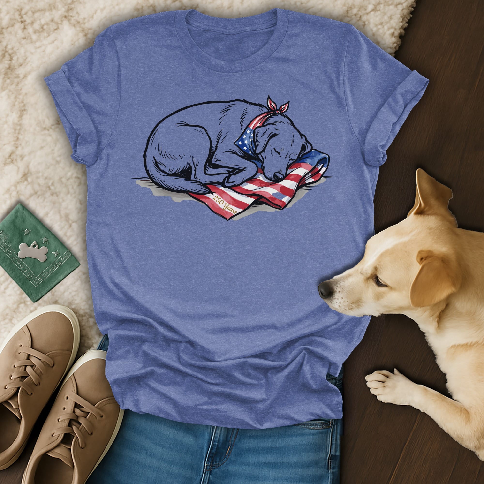 Sleeping dog with bandana on a flag, on a blue t-shirt.