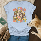 Light blue t-shirt featuring a graphic of an older dog wearing a flower crown and text reading Gray Hair Don't Care.