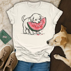 Dog wearing a t-shirt with a puppy eating watermelon graphic.