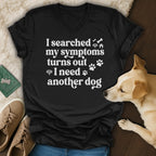 Black v-neck t-shirt with white text "I searched my symptoms turns out I need another dog".