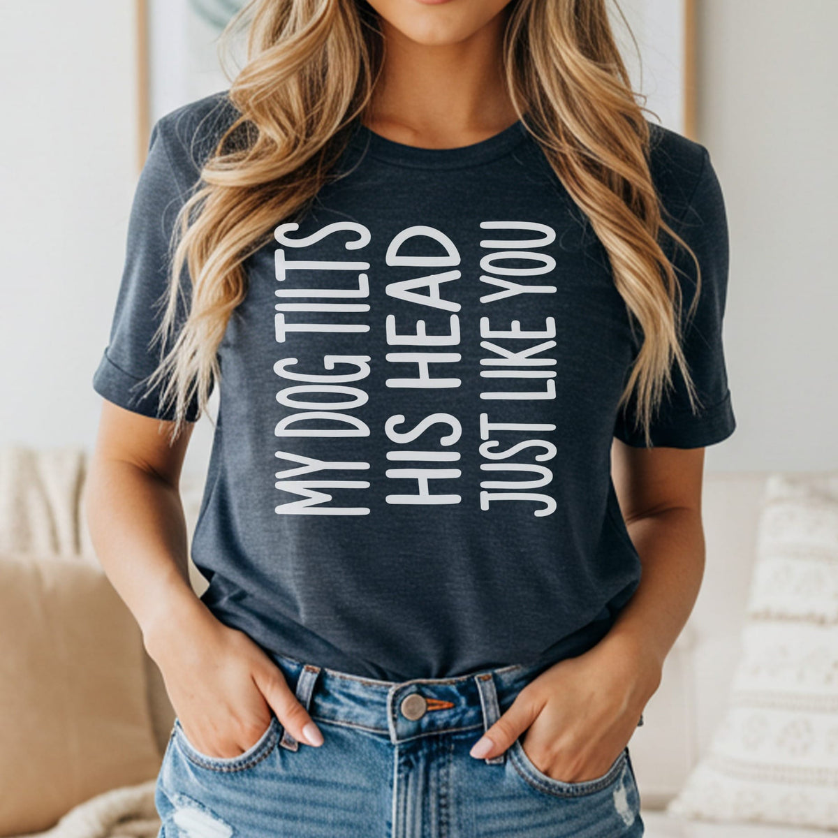 Dark grey t-shirt with white text "MY DOG TILTS HIS HEAD JUST LIKE YOU".