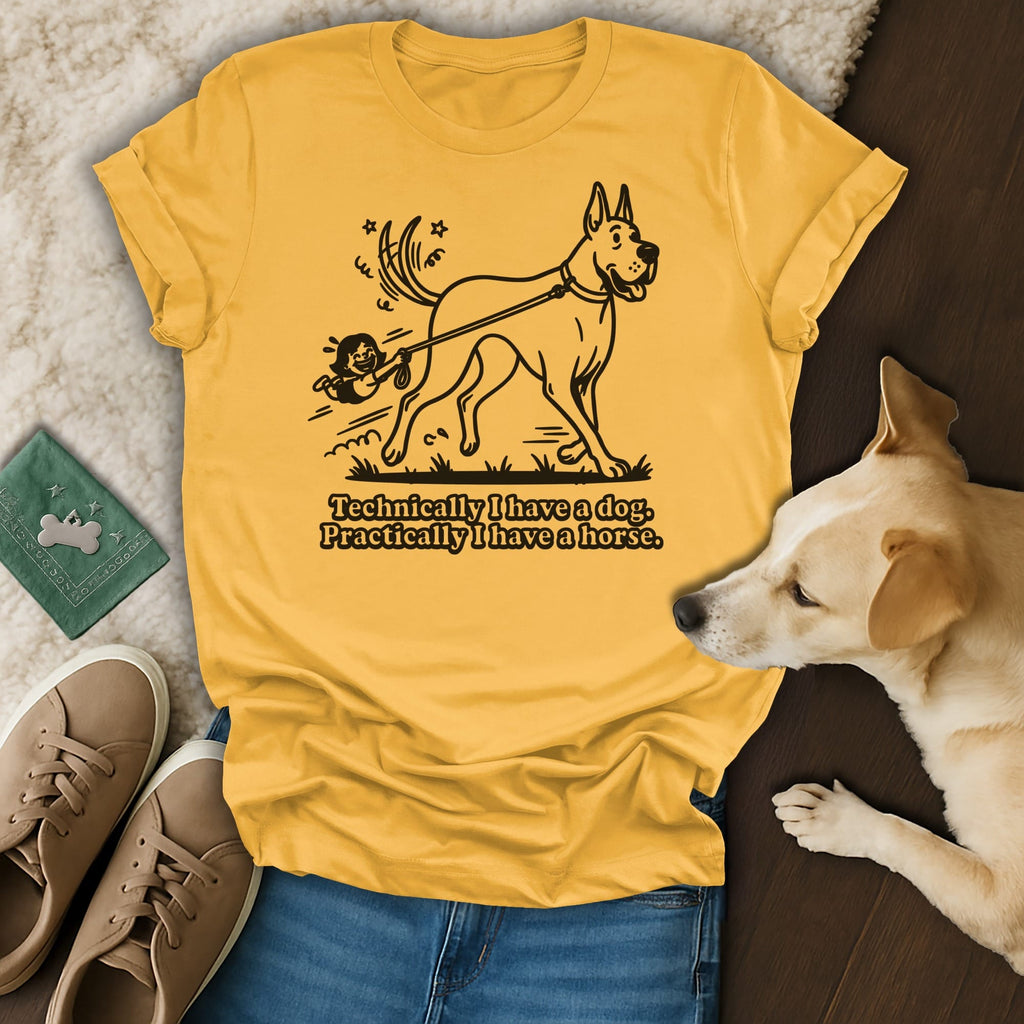 Yellow t-shirt with dog graphic and text "Technically I have a dog. Practically I have a horse."