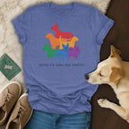 Blue t-shirt with rainbow dogs graphic and text "sorry i'm late, dog traffic."